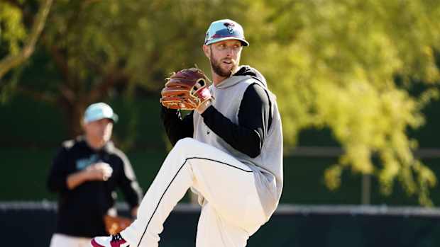 Arizona Diamondbacks right-hander Merrill Kelly participates in PFP drills at Salt River Fields.